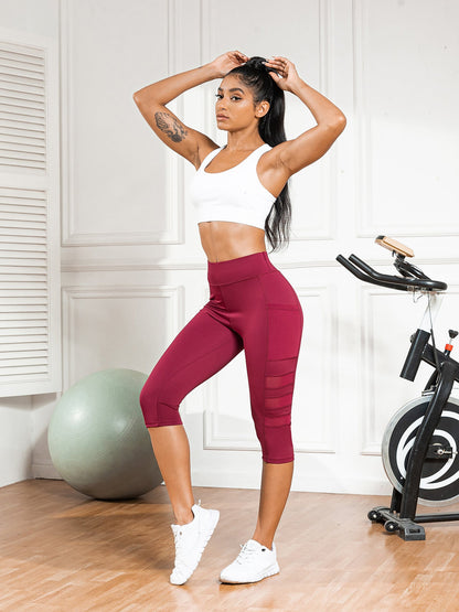 Slim-fit 7/8-length pants with mesh pockets for running, fitness, yoga, and casual wear