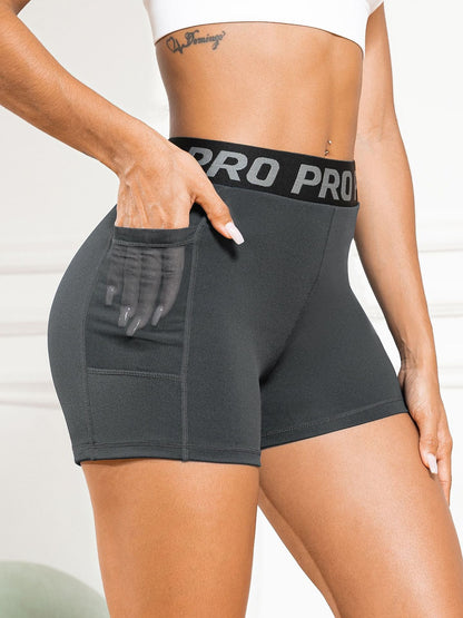 Women's High-Waisted Butt-Lifting Yoga Pants with Mesh Pockets and Three-Quarter Length for Running and Fitness