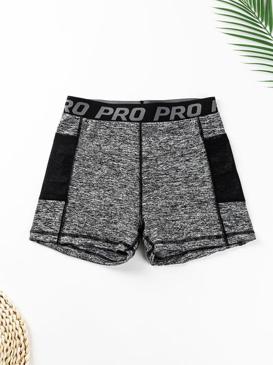 Women's High-Waisted Butt-Lifting Yoga Pants with Mesh Pockets and Three-Quarter Length for Running and Fitness