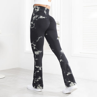 Black and white tie-dye leggings worn by a person on a white background