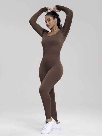Person wearing a brown bodysuit on a white background