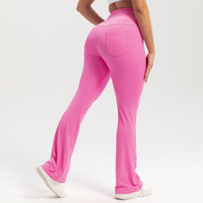 Person wearing bright pink pants on a white background