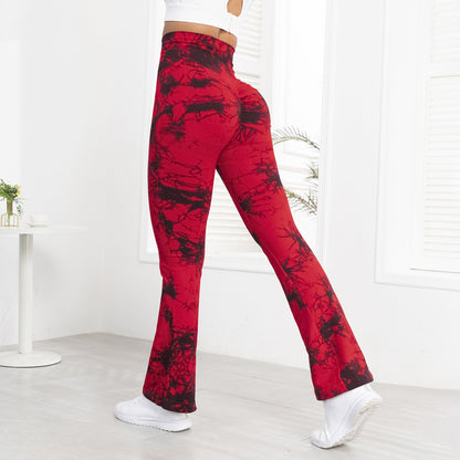 Red and black patterned leggings worn by a person indoors.