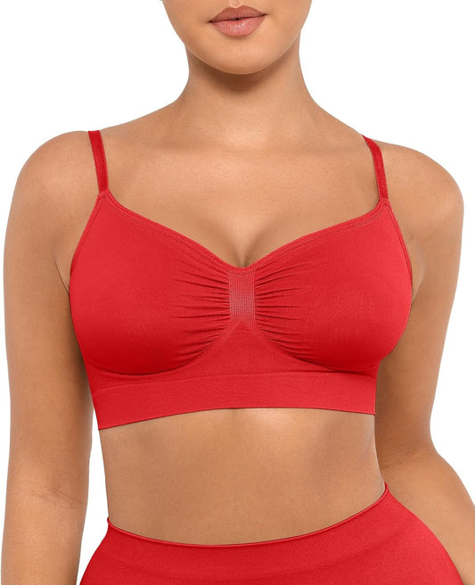 Red sports bra worn by a person on a white background