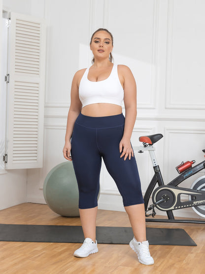 Woman in athletic wear standing in a home gym setting